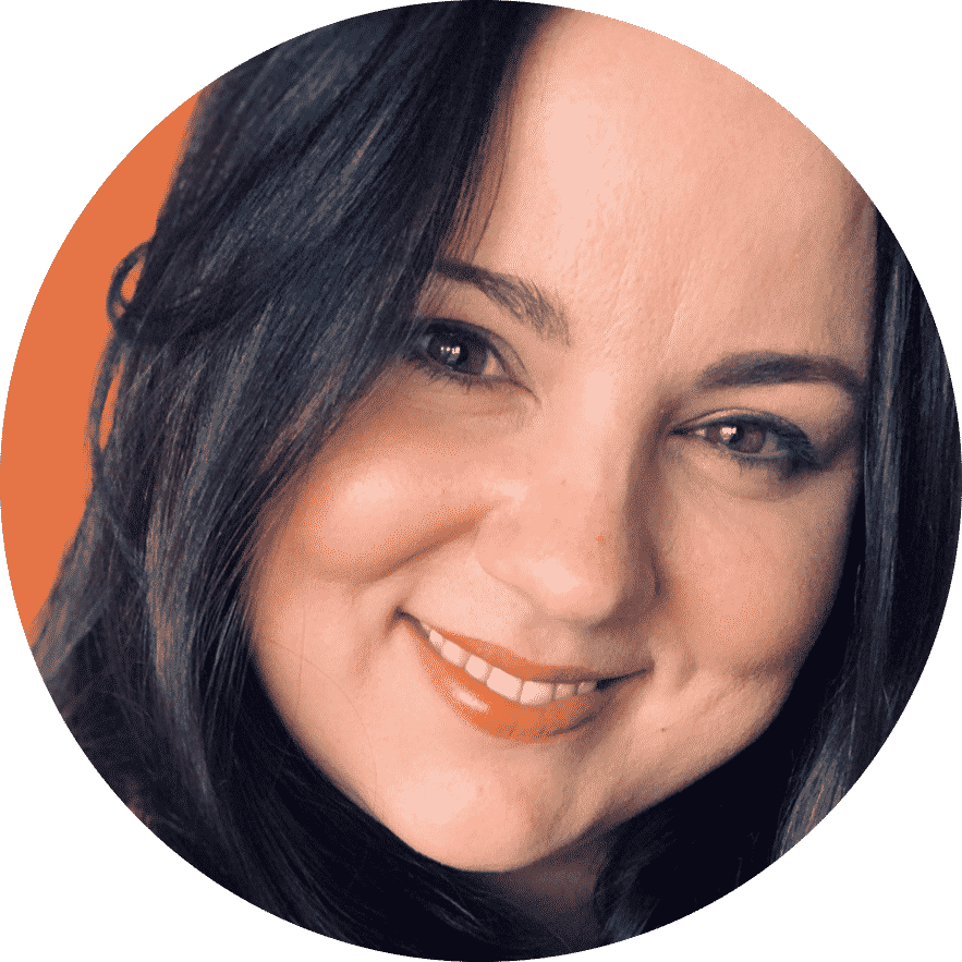 Emma Griffiths 2022 Smiling Headshot with Orange Background